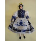 90. Porcelán baba kékfestő népi viseletben, 20 cm